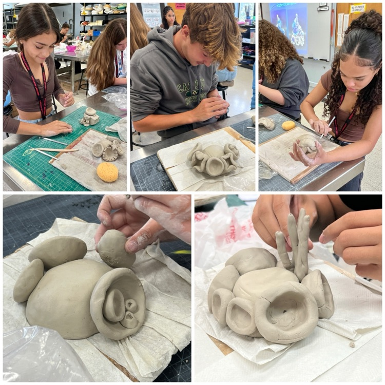 Ceramics 1 students working on their coral reef sculptures based on the work of ocean conservation activist & artist Courtney Mattison.