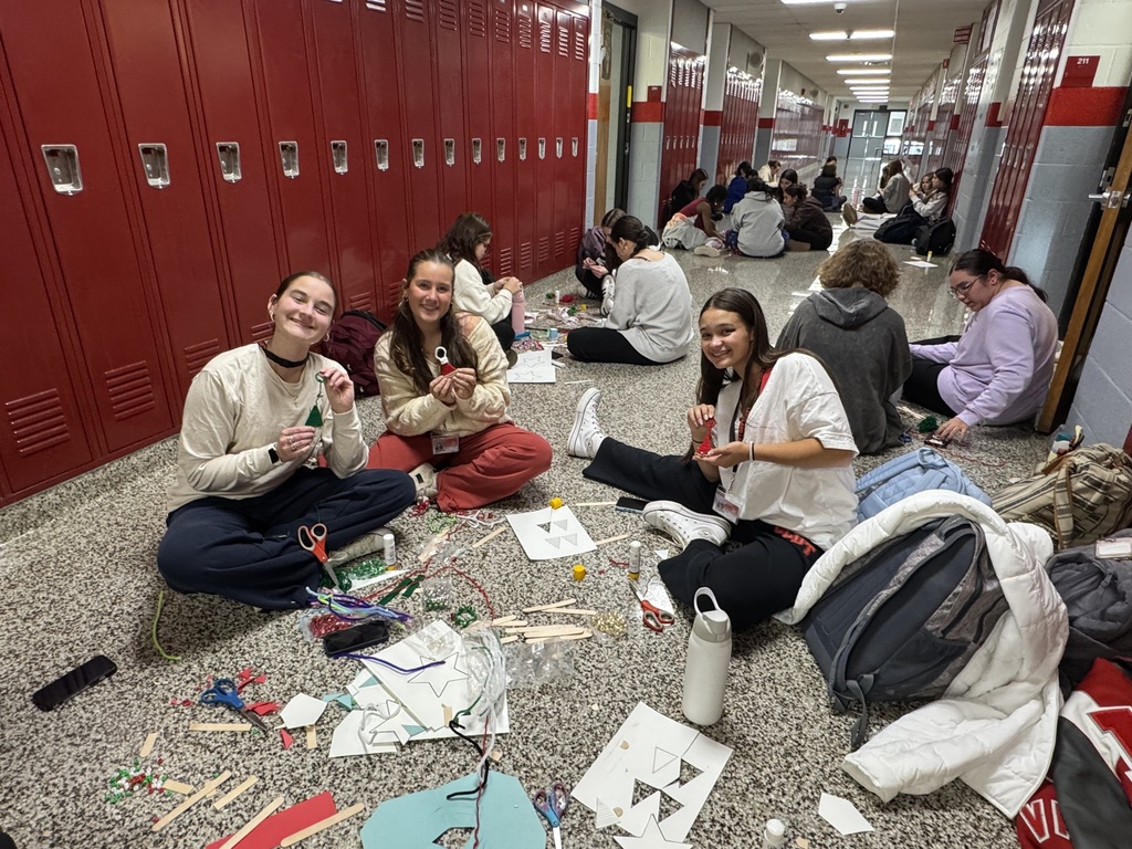 Service Club students make Christmas ornaments to send to troops and veterans.