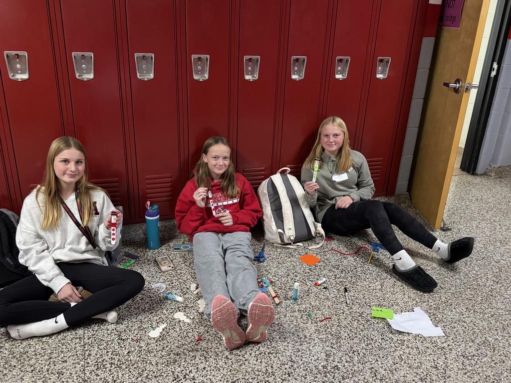 Service Club students make Christmas ornaments to send to troops and veterans.
