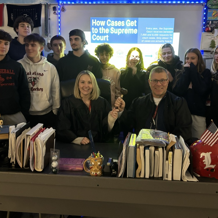 Mrs. Higgins & Mr. Mac living the dream as Supreme Court judges while lecturing about Article III to U.S. History students.  