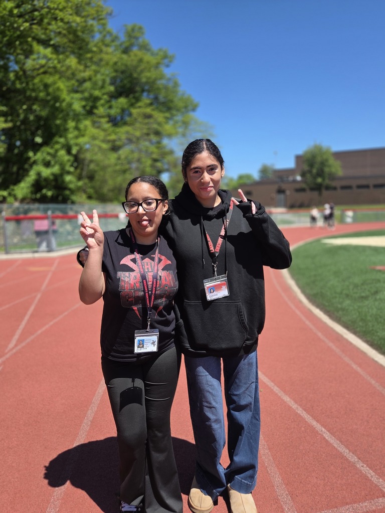 Students and teachers walk the track in a walkathon to raise money for The Seeing Eye of Morristown.