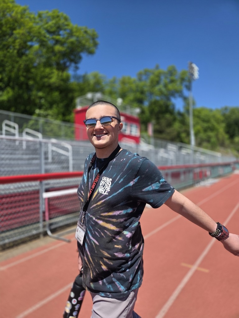 Students and teachers walk the track in a walkathon to raise money for The Seeing Eye of Morristown.