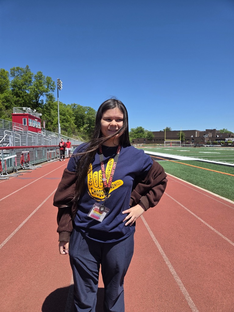 Students and teachers walk the track in a walkathon to raise money for The Seeing Eye of Morristown.
