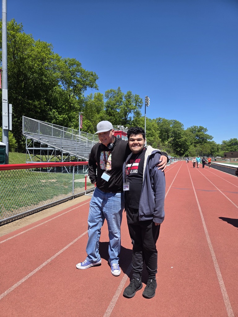 Students and teachers walk the track in a walkathon to raise money for The Seeing Eye of Morristown.