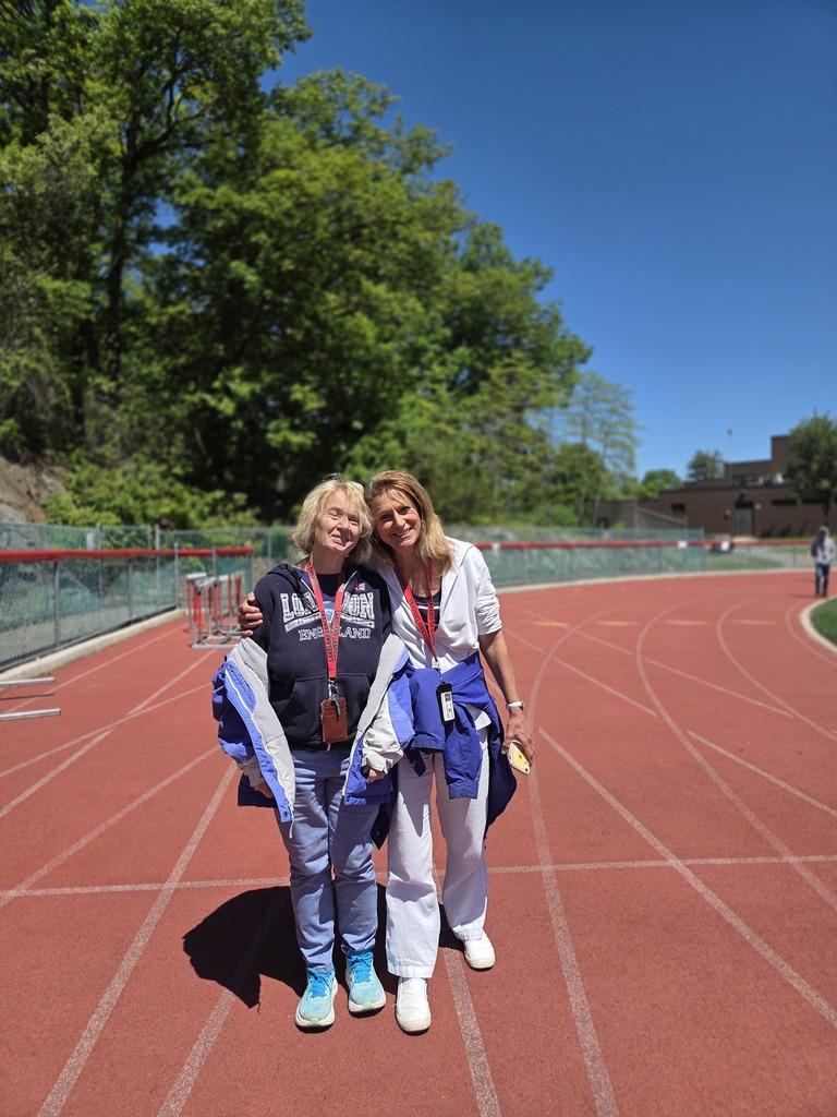 Students and teachers walk the track in a walkathon to raise money for The Seeing Eye of Morristown.