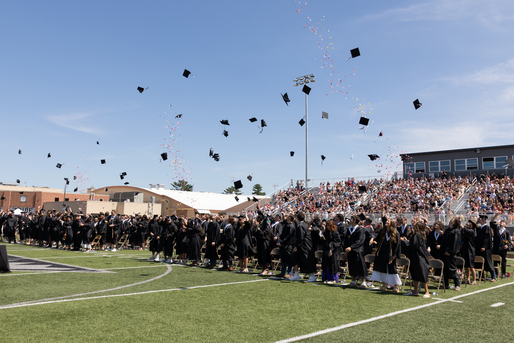 Caps in the air at the end of the ceremony.