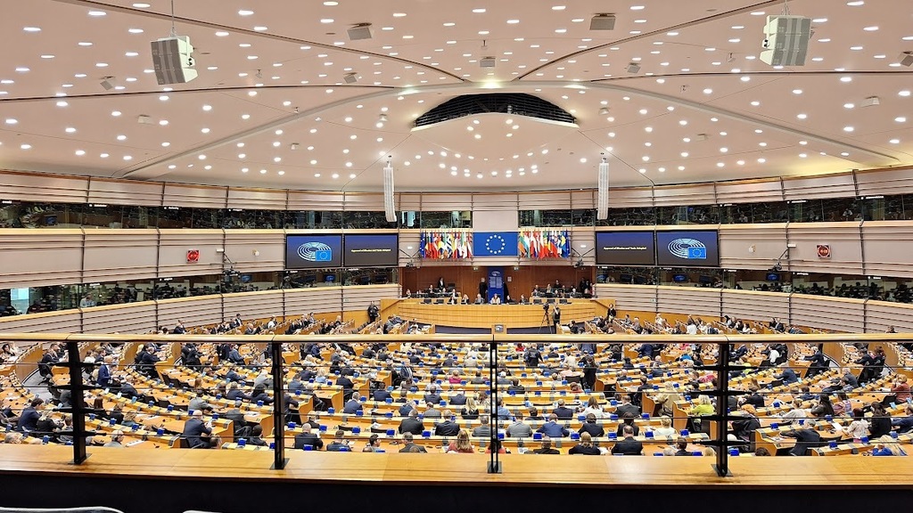 ttending a live session of the European Parliament in Brussels