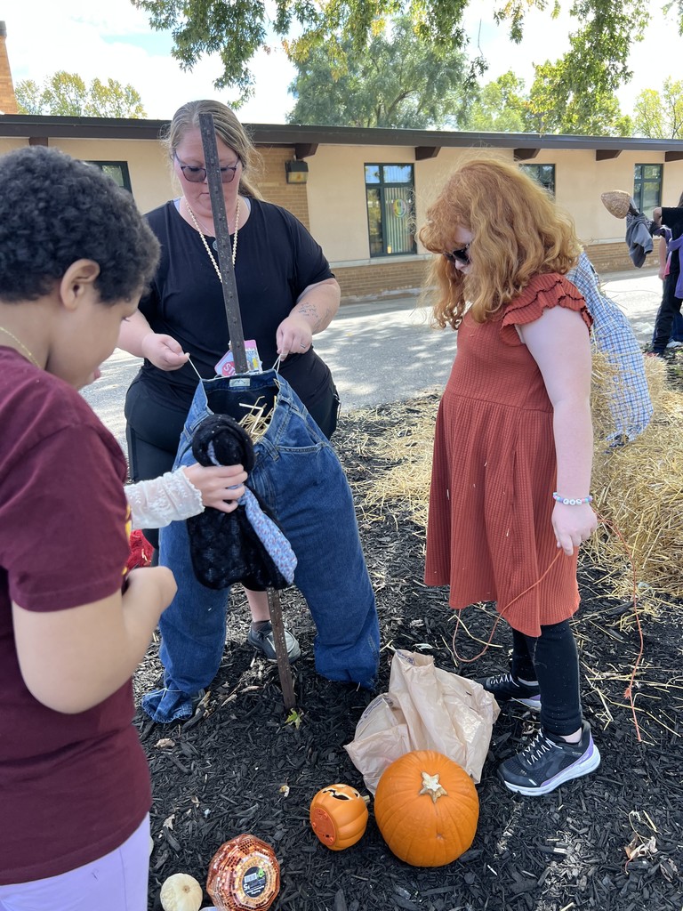 The 4th graders at Columbiaville Elementary transformed the school entrance into a scarecrow runway, each one a masterpiece of creativity strutting their straw-stuffed stuff!