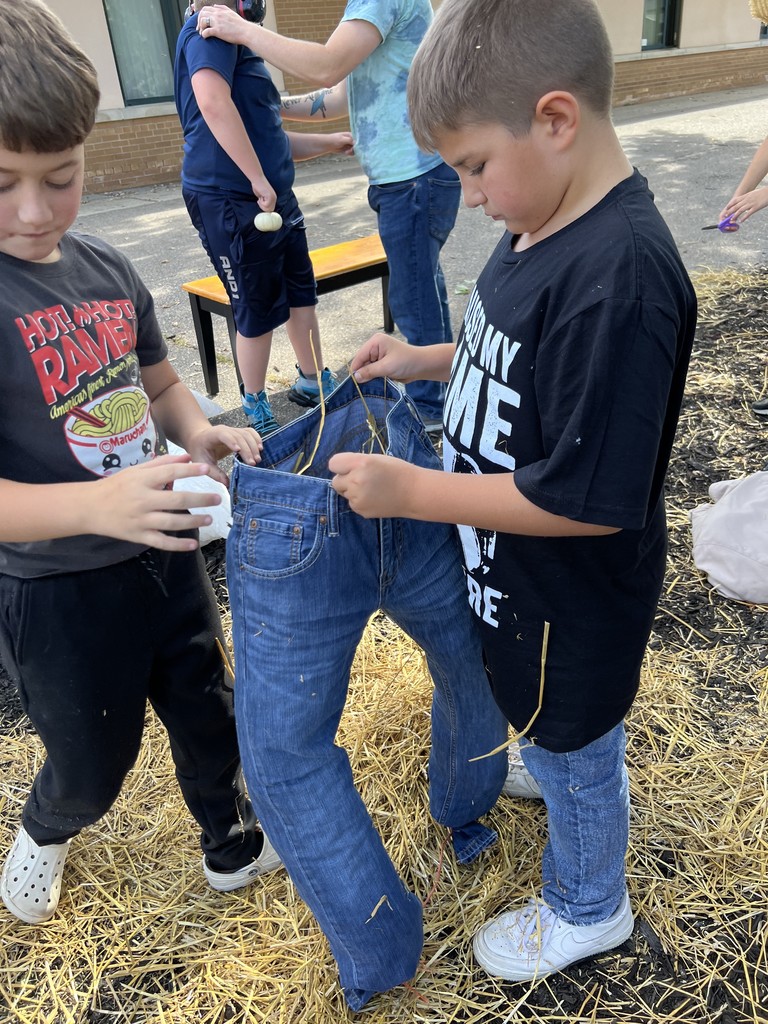 The 4th graders at Columbiaville Elementary transformed the school entrance into a scarecrow runway, each one a masterpiece of creativity strutting their straw-stuffed stuff!
