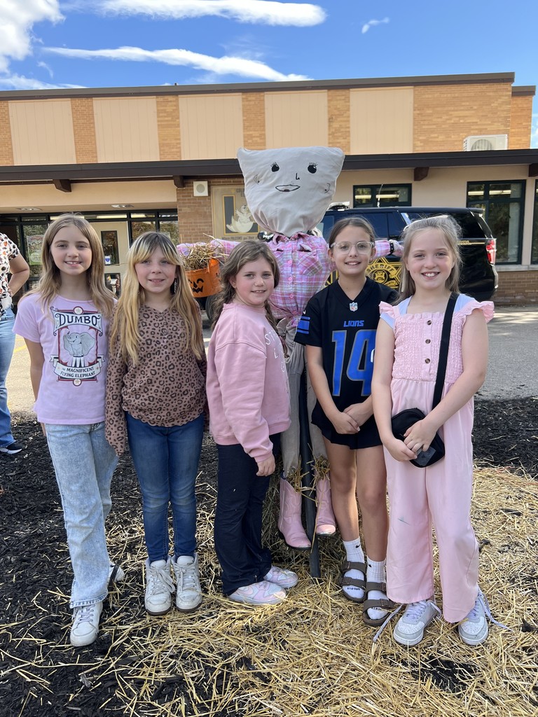 The 4th graders at Columbiaville Elementary transformed the school entrance into a scarecrow runway, each one a masterpiece of creativity strutting their straw-stuffed stuff!