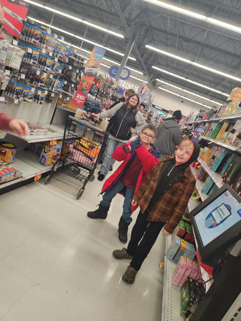 The Columbiaville Student Council hit the shops, spreading cheer for the Community Giving Tree!