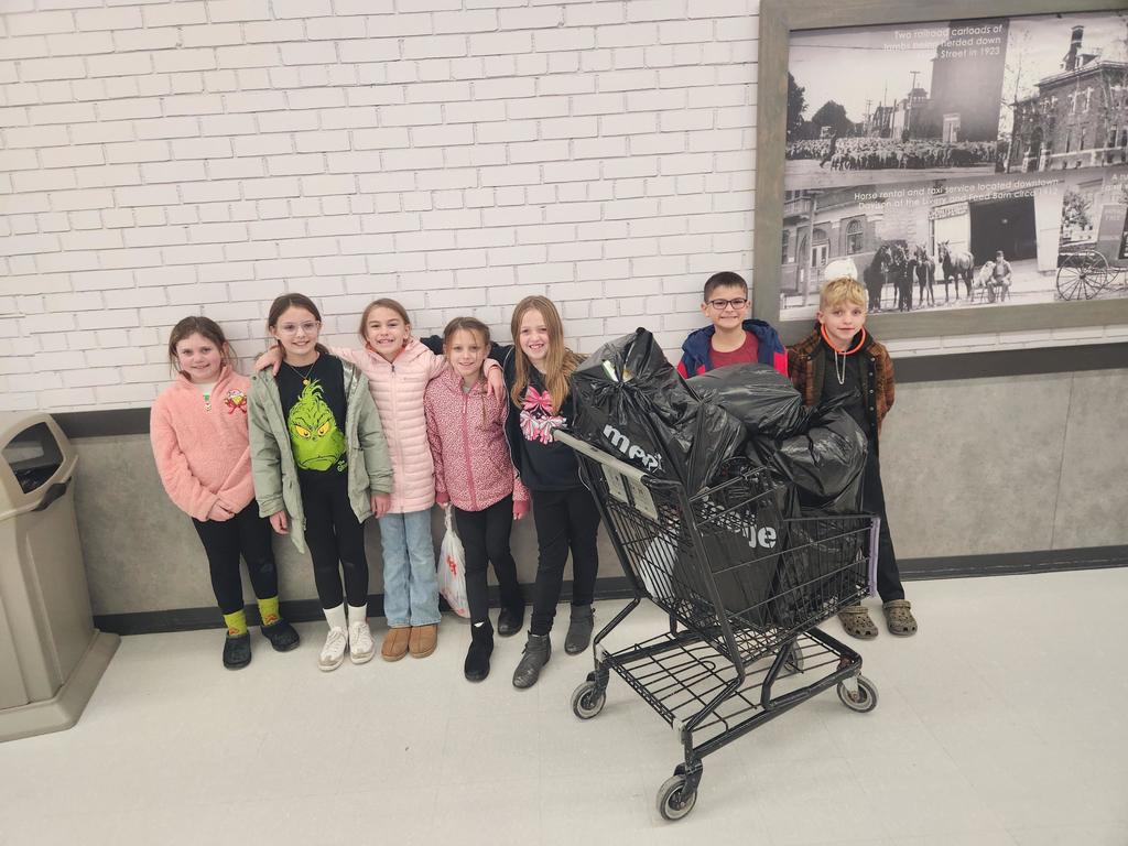 The Columbiaville Student Council hit the shops, spreading cheer for the Community Giving Tree!