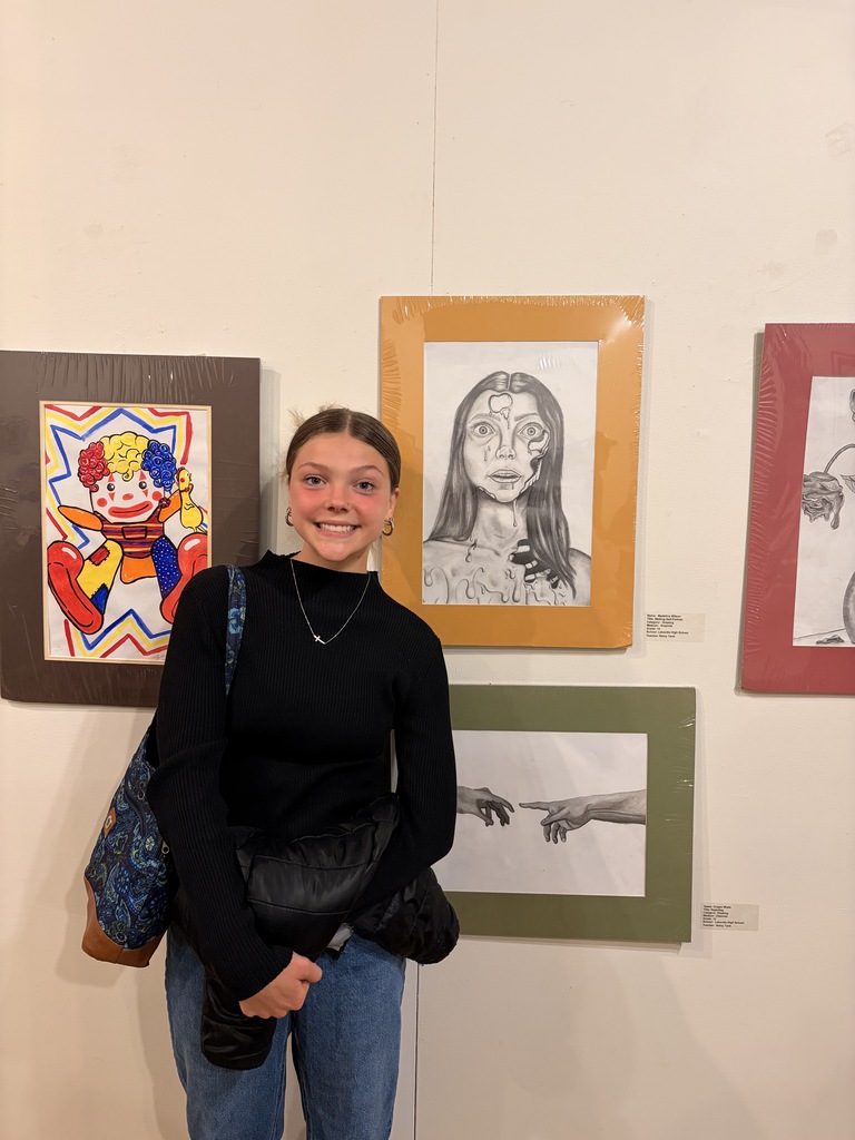 Student Artists who were able to make it to the show opening pictured with their work, Mariyah McNeil, Maddie Wilson, and Samantha Compton.