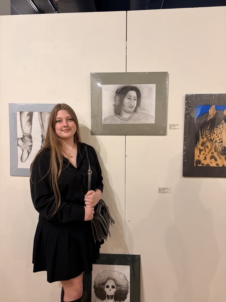 Student Artists who were able to make it to the show opening pictured with their work, Mariyah McNeil, Maddie Wilson, and Samantha Compton.
