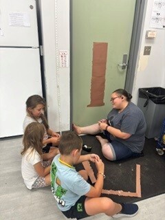 Photo of kids participating in arts and crafts