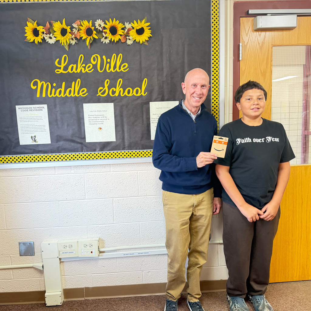 Drawing winner Santino Fick with MS Principal Mr. McCall