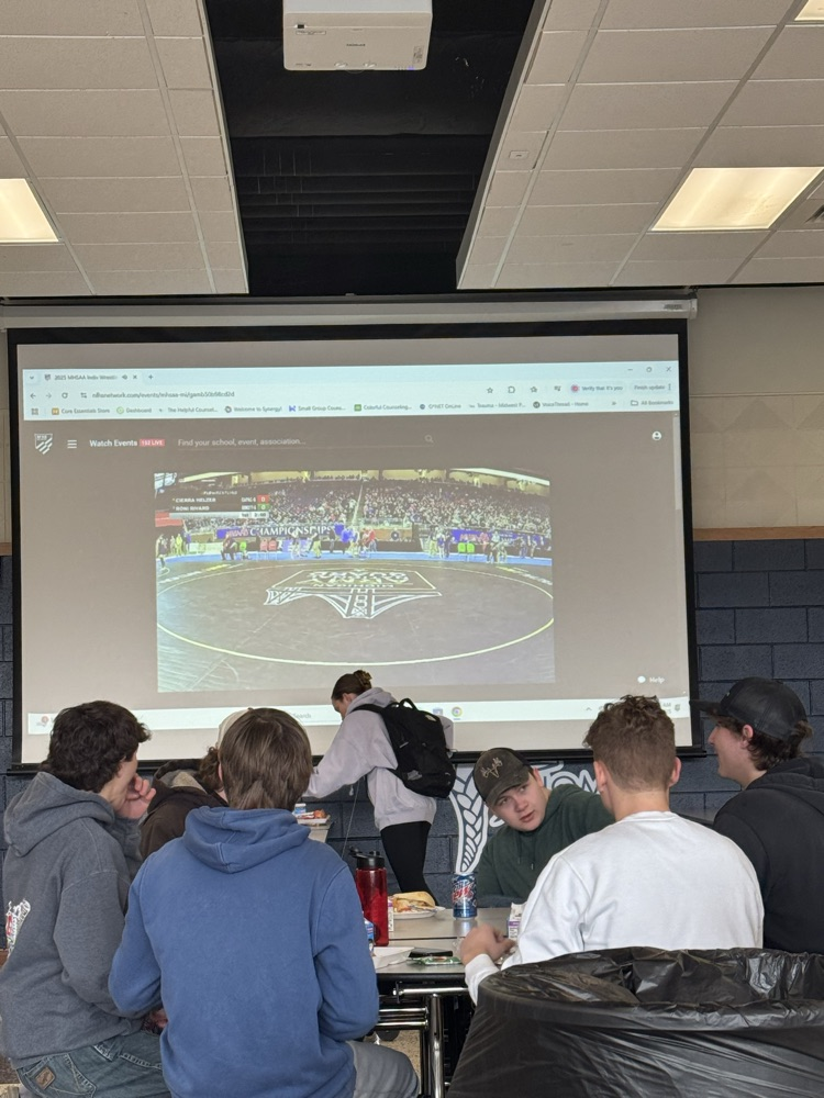 students watching wrestling