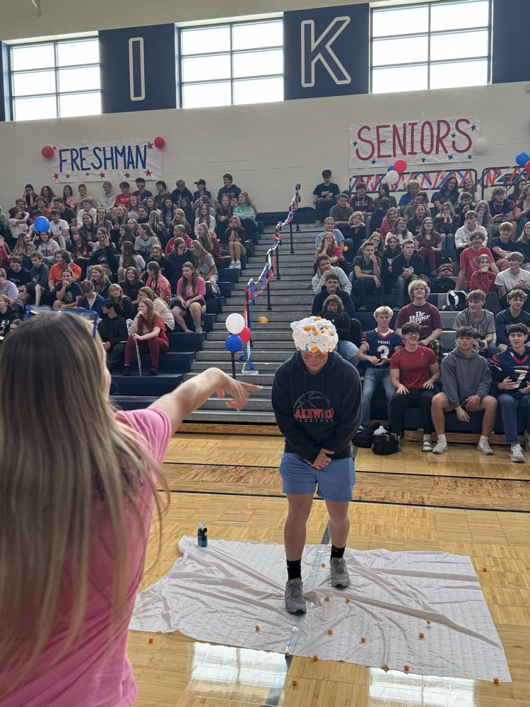 student with cream on their head