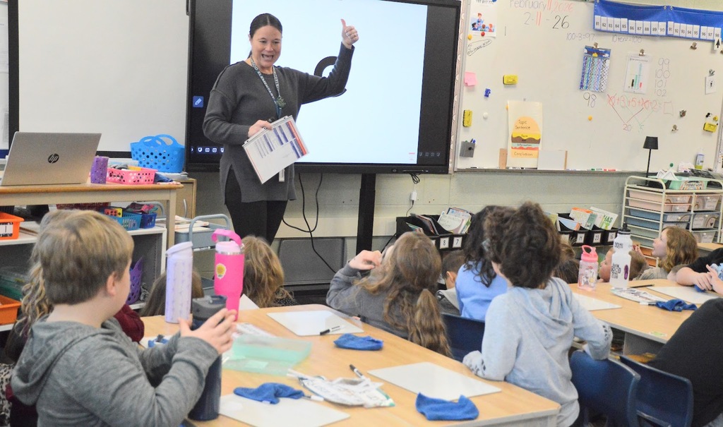 Mrs. Spitzley teaching her students 