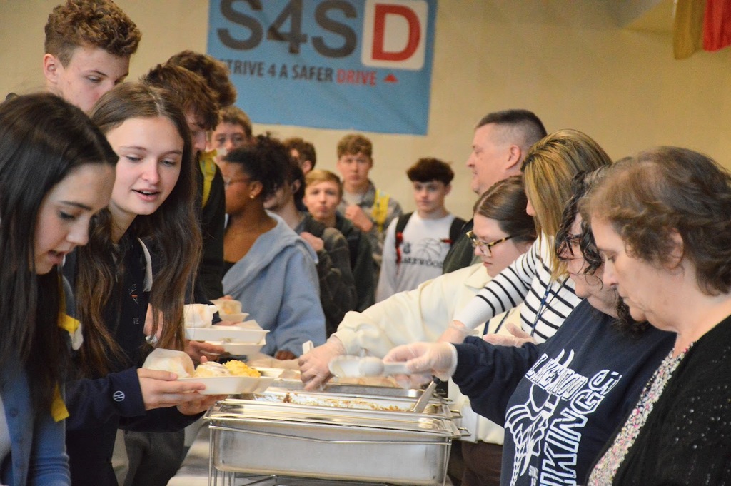 LHS Students being served for Academic breakfast 