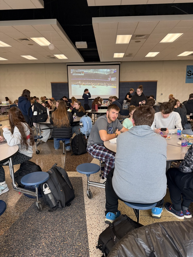 eating lunch watching wrestling