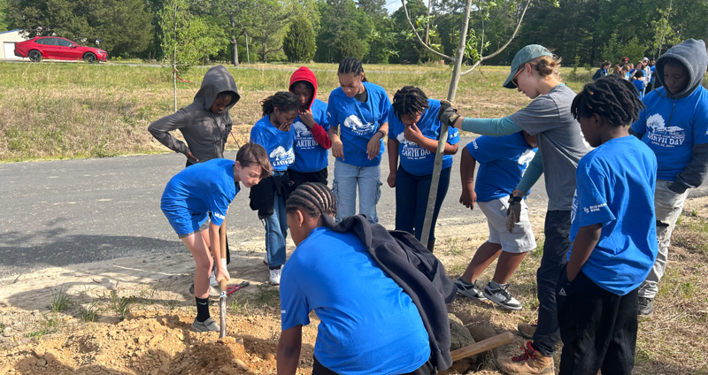 6th graders with the Friends of the Rappahannock planting trees at the new LHS