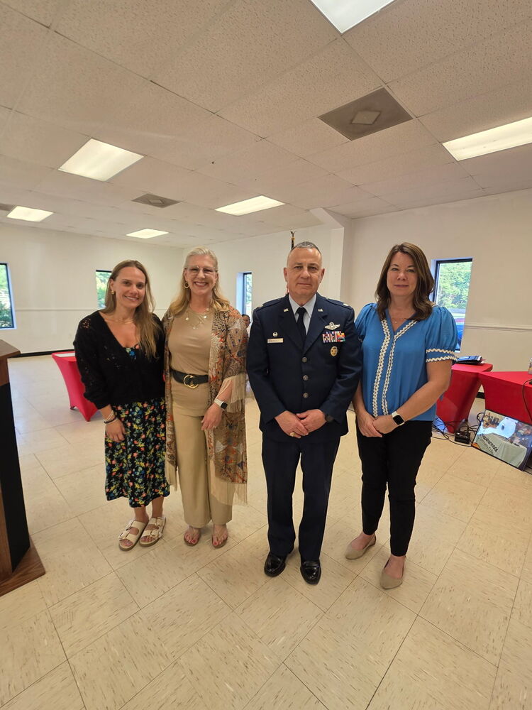 Heidi Lally, Krista Maynard, RG McManus and Sarah Pittman at the School Board Meeting.
