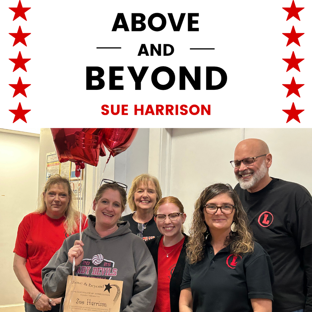 Sue Harrison receives their Above and Beyond award