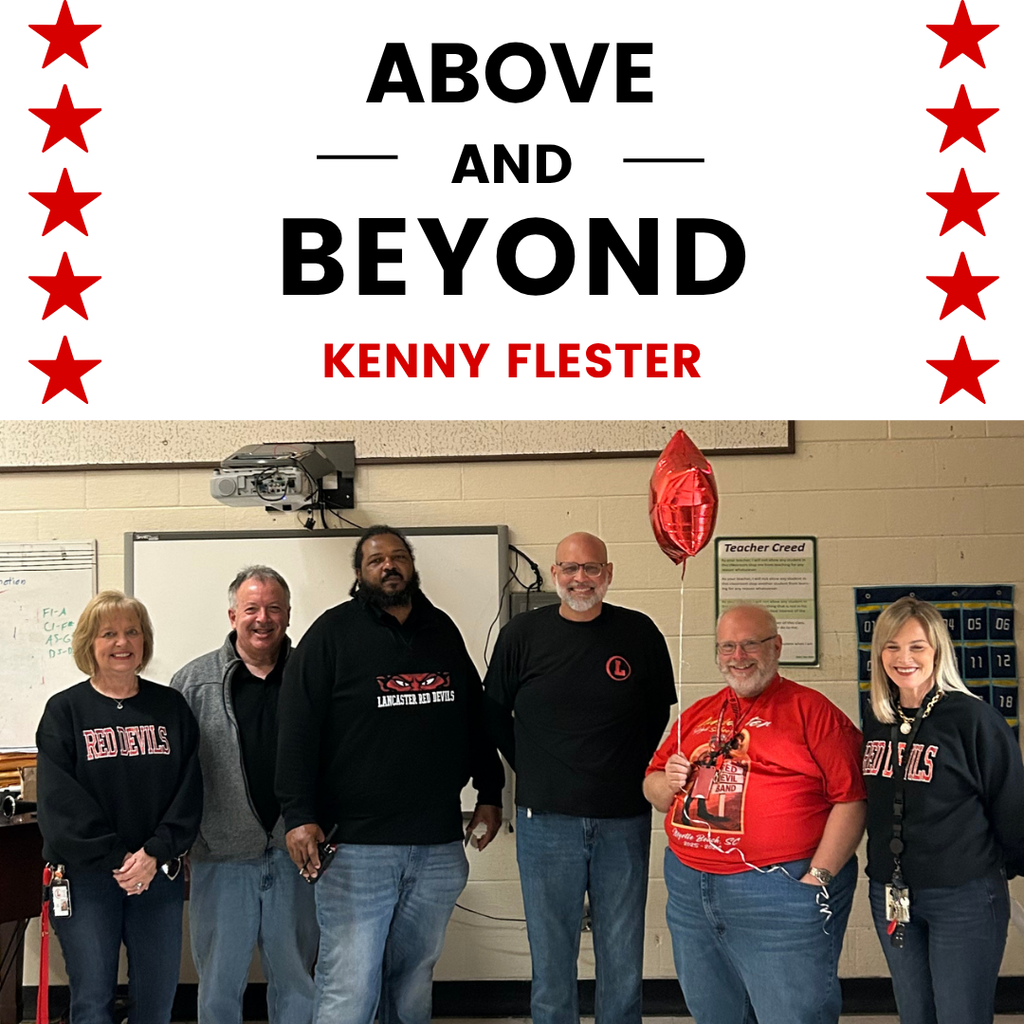 Kenny Flester receives their Above and Beyond award