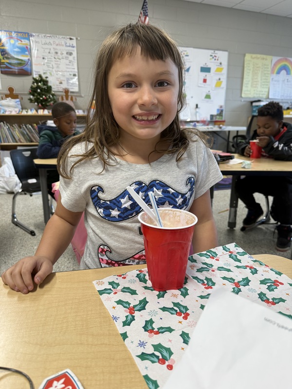 Student enjoying a root beer float