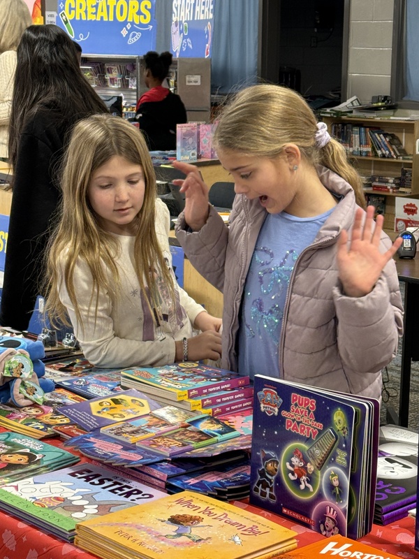 4th grade students at the book fair