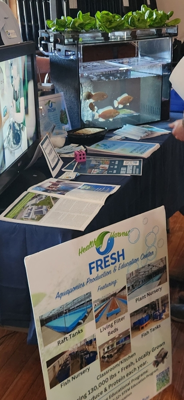 Picture of the Healthy Harvest FRESH booth about aquaponics
