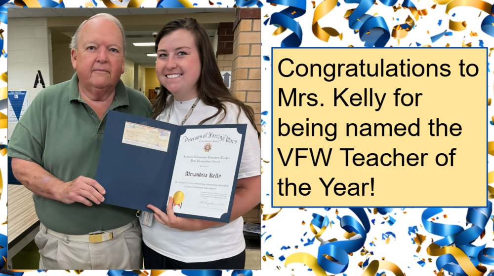 Picture of Mrs. Kelly and VFW representative with the award
