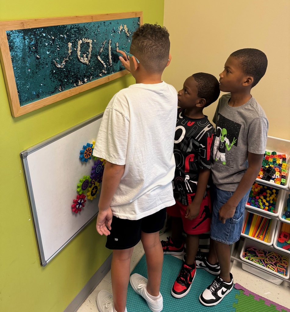 Students playing with the sensory toys on the first day of school