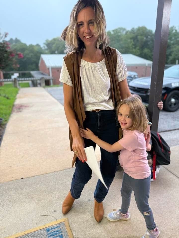 Parent dropping off a student