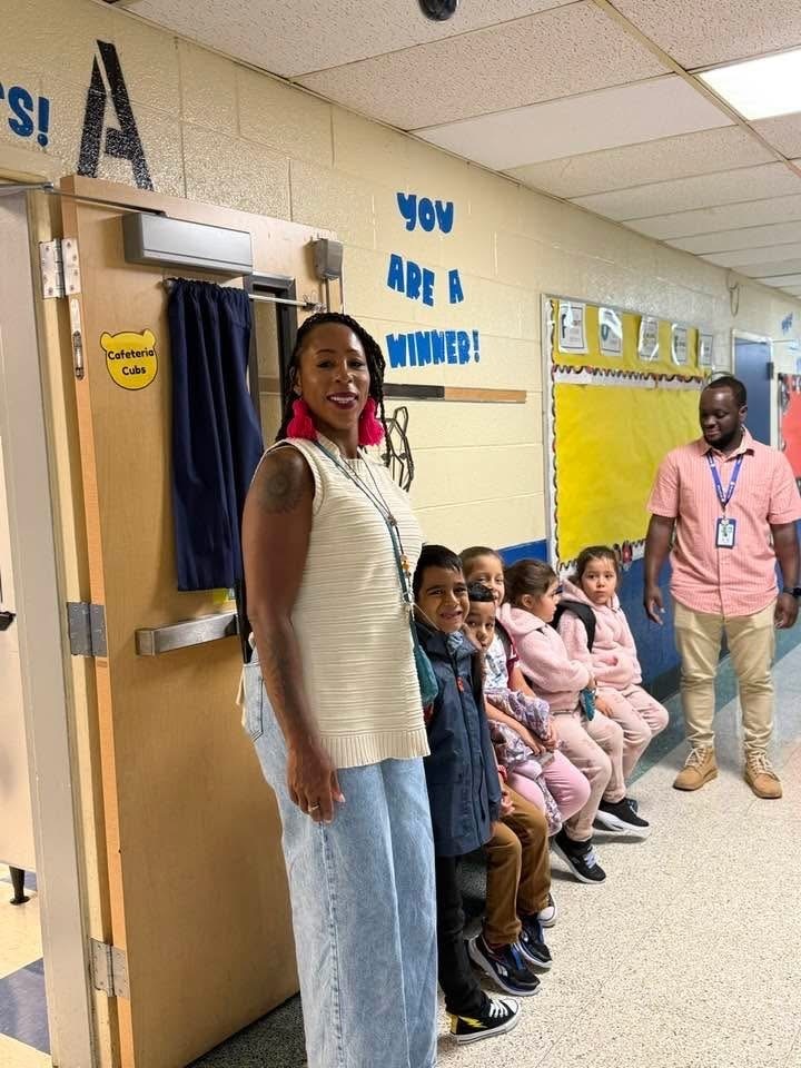 Teachers and students standing in line