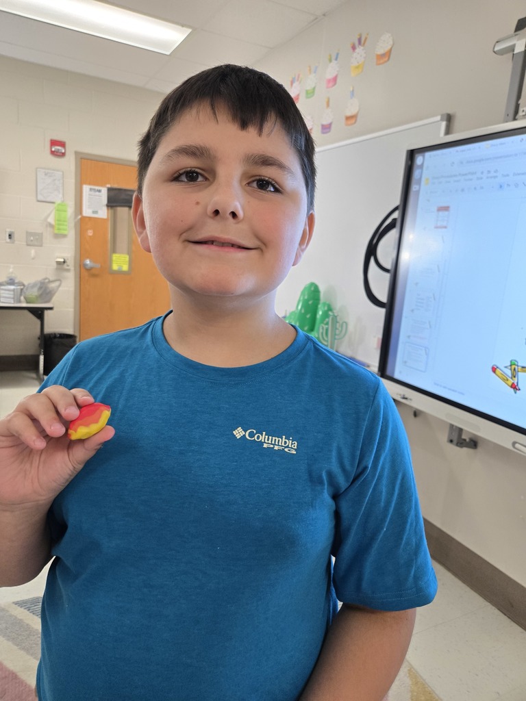 Student holding puddy