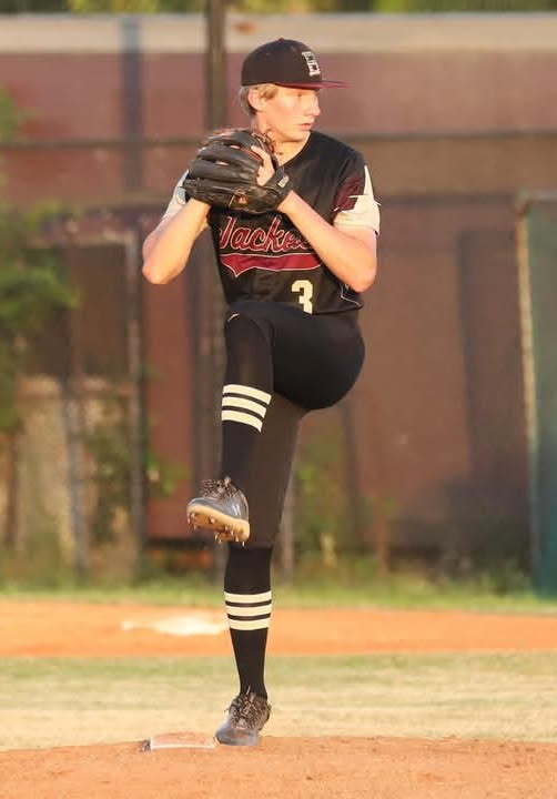Student playing baseball