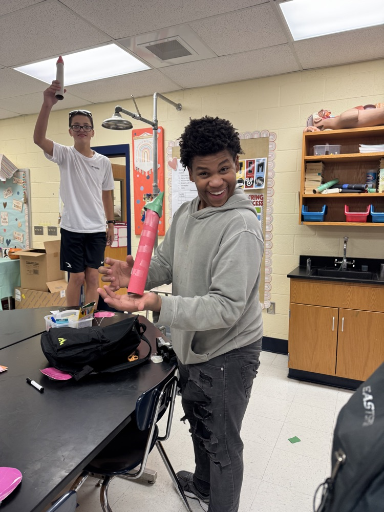 Working hard building rockets
