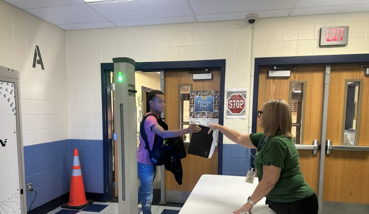 Students passing through the new Weapon Detectors  