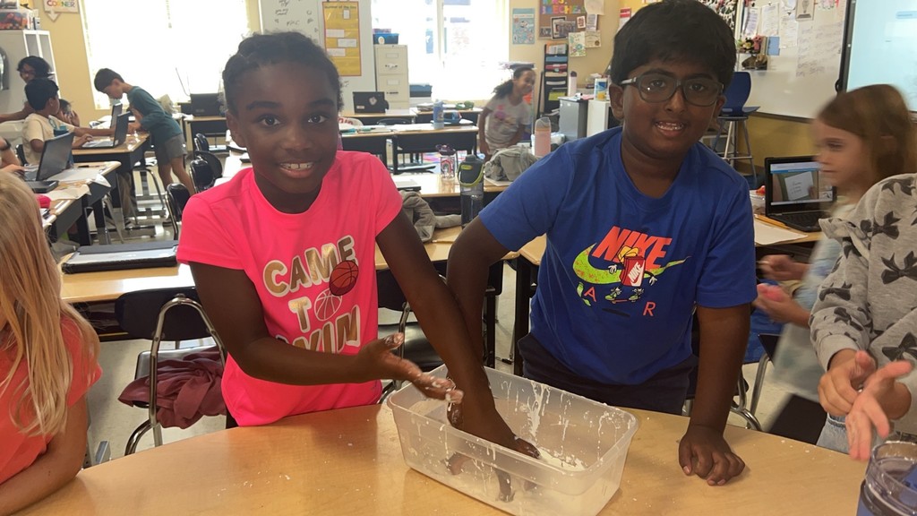 2nd graders making Oobleck