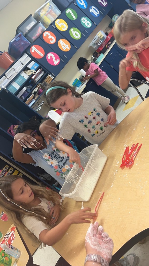 2nd graders making Oobleck