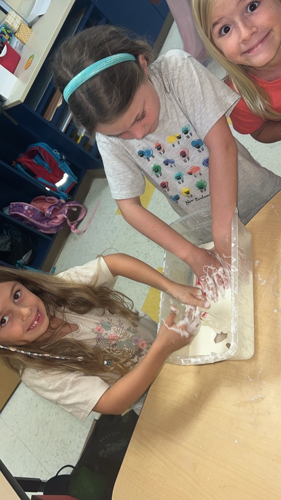 2nd graders making Oobleck