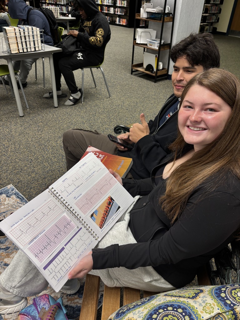 Image of students in the library