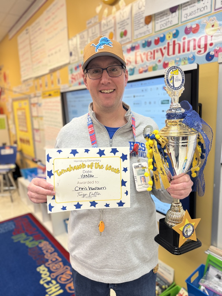 Mr Walburn with the Tomahawk of the Week trophy