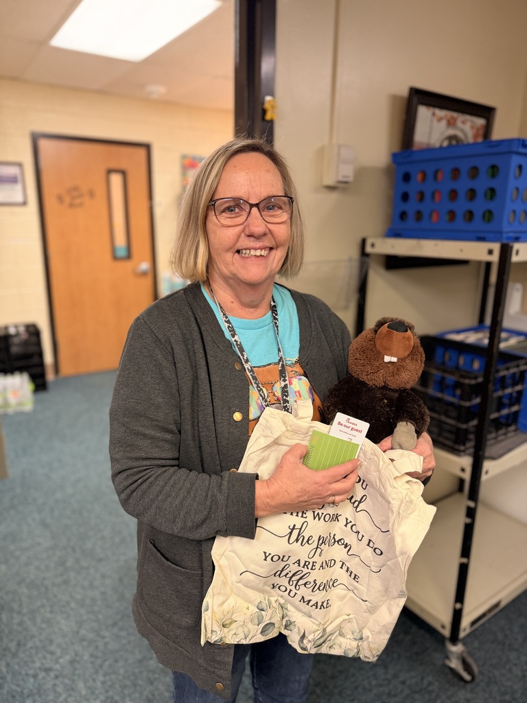 Becky with a stuffed beaver.
