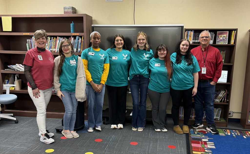Teacher cadets with principal and instructor.