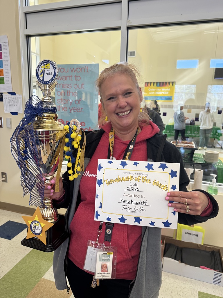 Kelly Nicoletti with the Tomahawk of the Week trophy