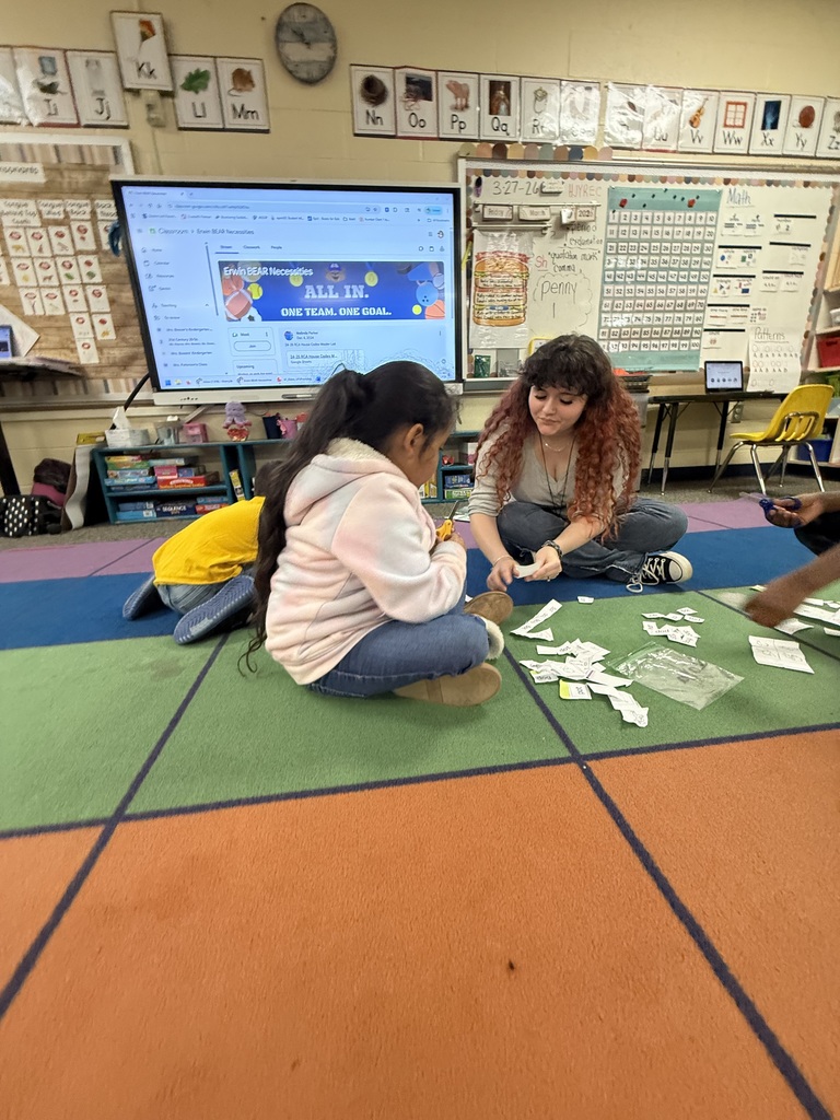 Alexis helping a student. 