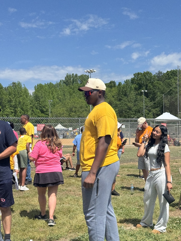 student volunteer on field